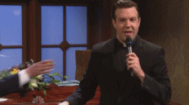 man grabbing mic and dropping it