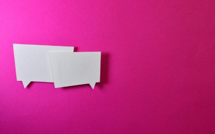 two white message balloons