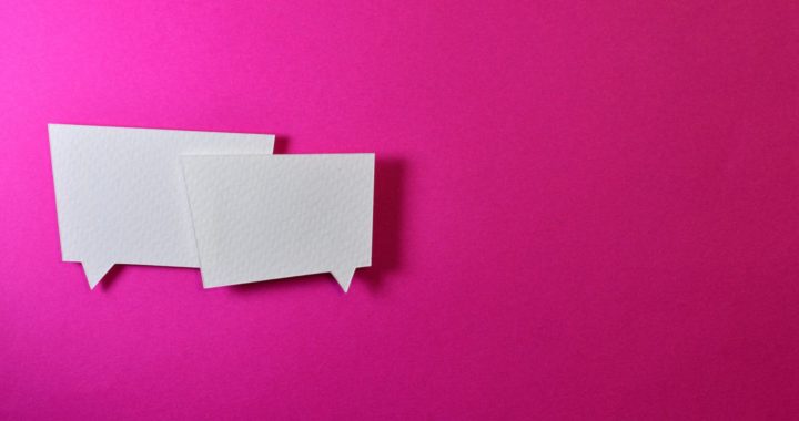 two white message balloons
